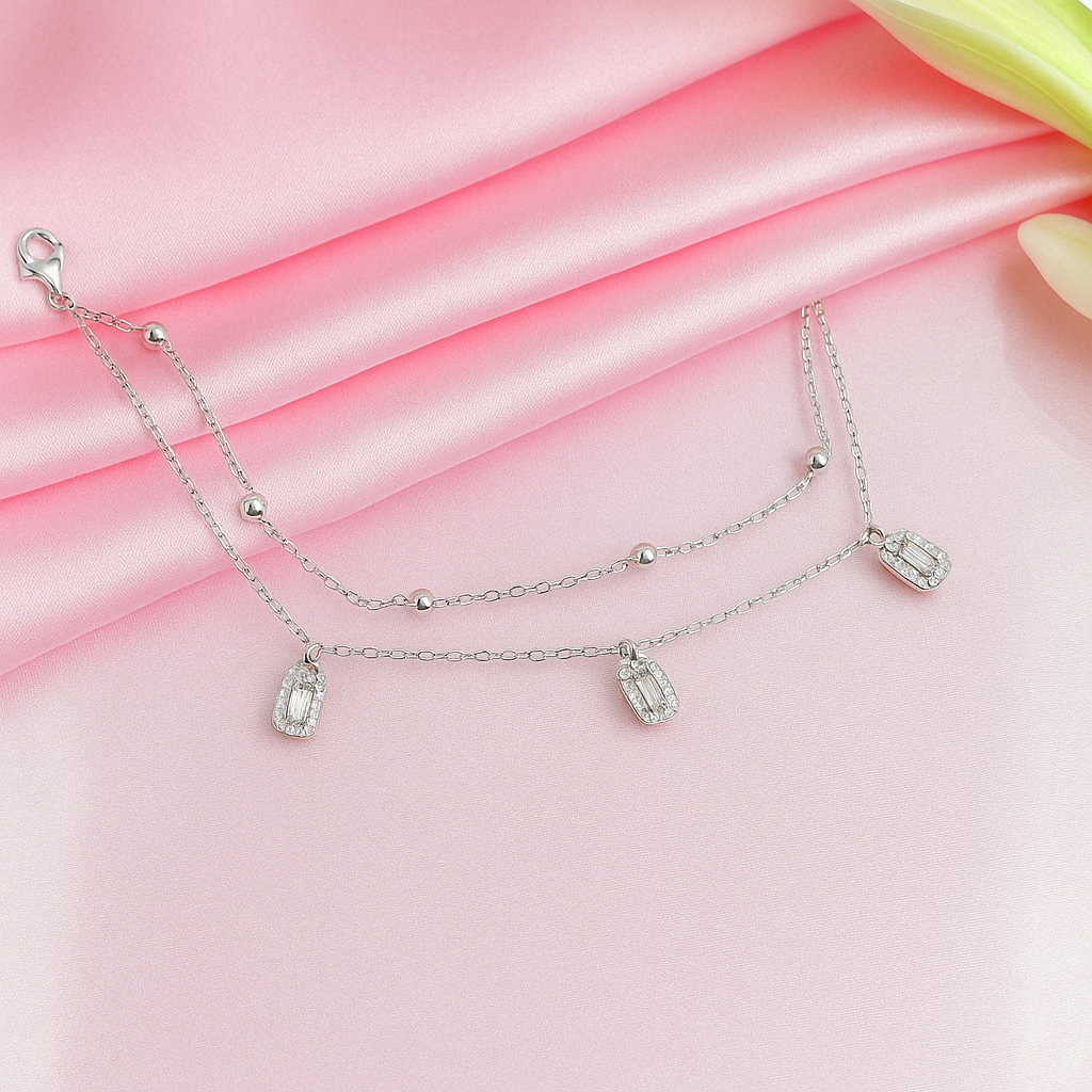 Layered Silver Chain Bracelet with Sparkling Charms
