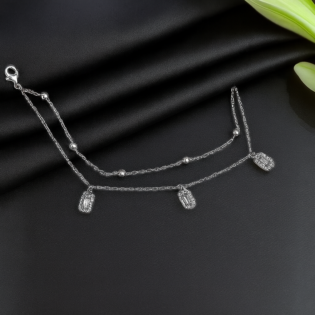 Layered Silver Chain Bracelet with Sparkling Charms
