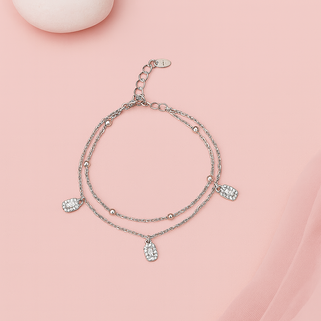 Layered Silver Chain Bracelet with Sparkling Charms