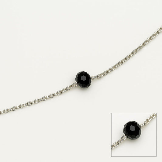 Silver anklet with single black bead