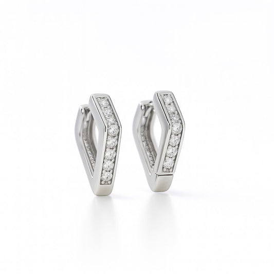 Pair of silver hoop earrings on a white background