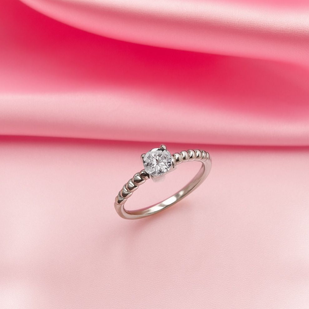 silver ring on a pink fabric background, perfect for office girl and everyday wear