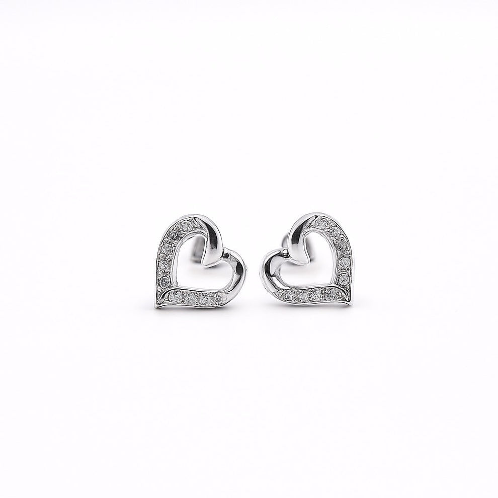 Heart-shaped earrings with small white stone on a white background