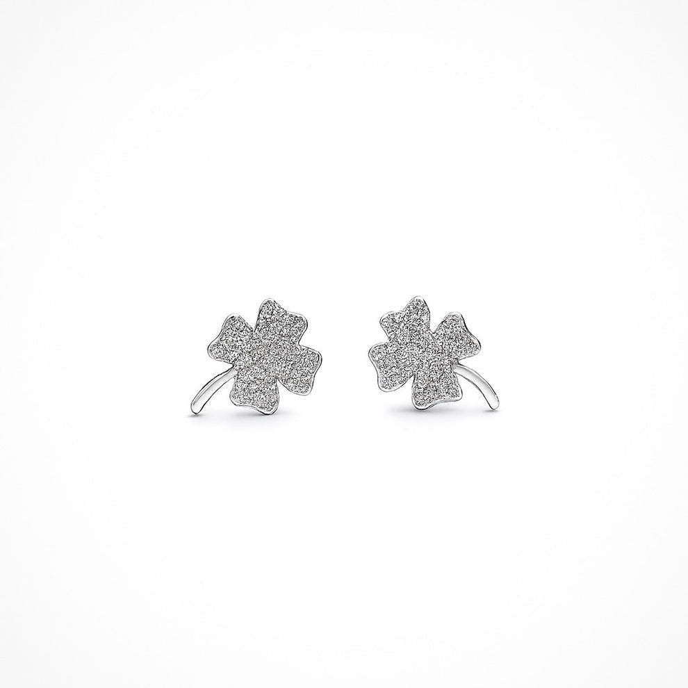 Pair of four-leaf clover sterling silver earrings on a white background