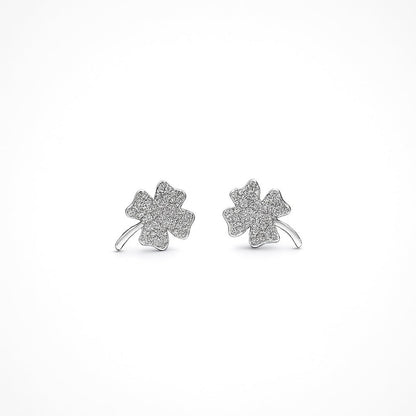 Pair of four-leaf clover sterling silver earrings on a white background