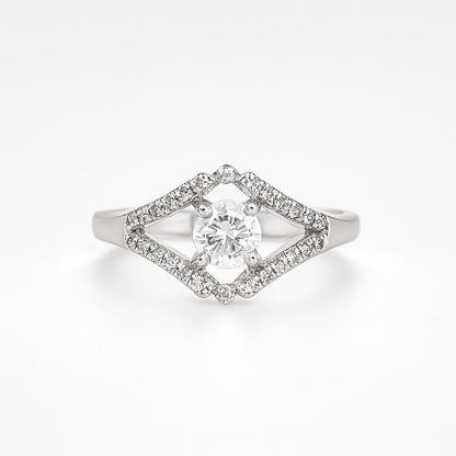 silver ring with a diamond-shaped halo on a white background