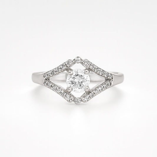 silver ring with a diamond-shaped halo on a white background