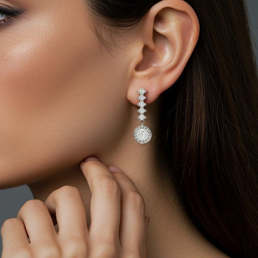 Close-up of a modern woman wearing elegant diamond earrings with a neutral background