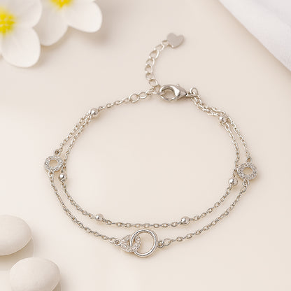 Layered Silver Chain Bracelet with Sparkling Circle Charms