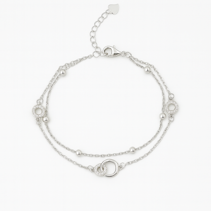 Layered Silver Chain Bracelet with Sparkling Circle Charms