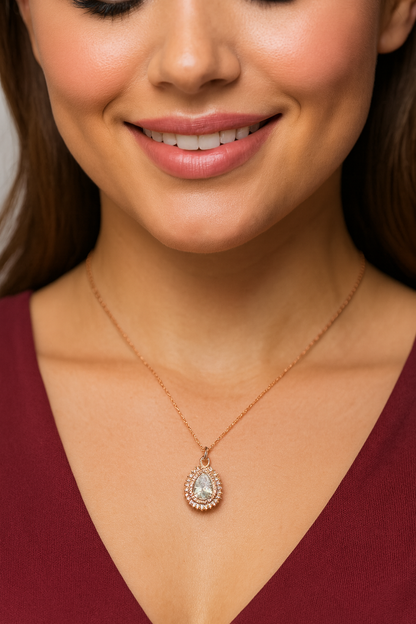 Sparkling Teardrop Halo Pendant in Rose Gold