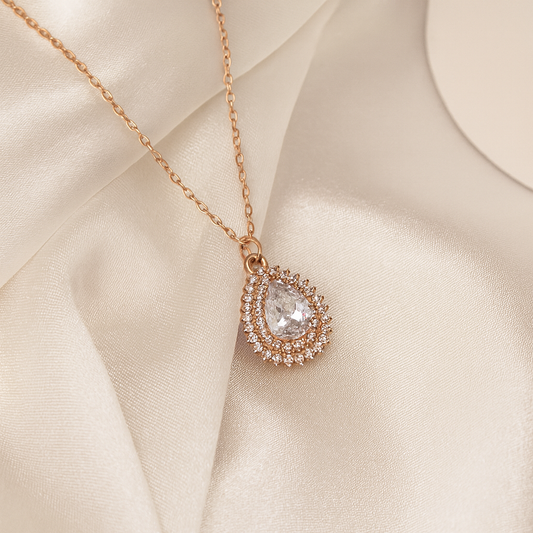 Sparkling Teardrop Halo Pendant in Rose Gold