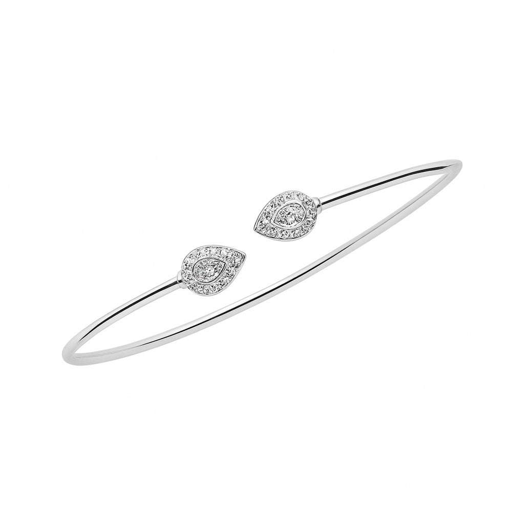 Silver bracelet with two diamond-like stone accents on a white background