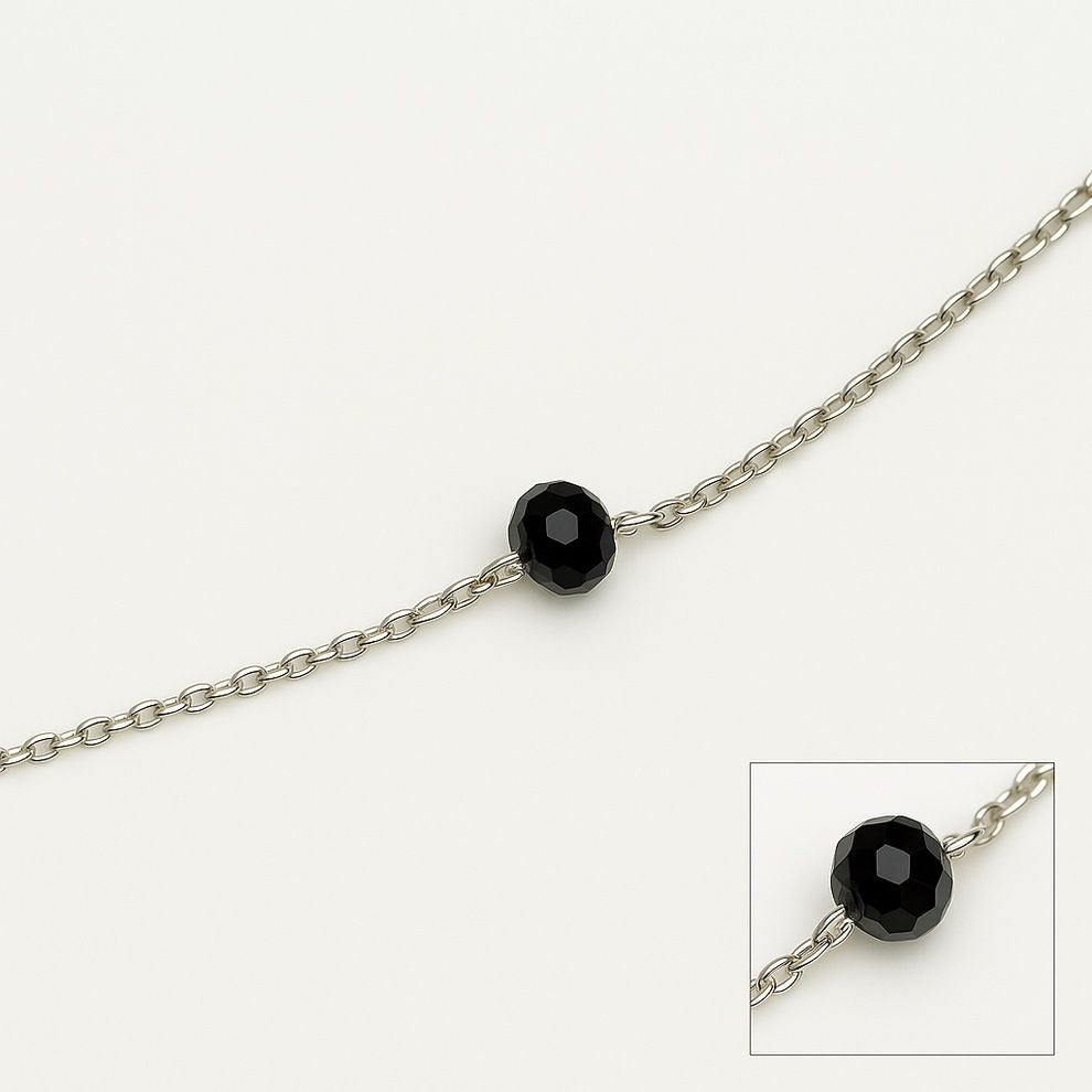 Silver anklet with single black bead