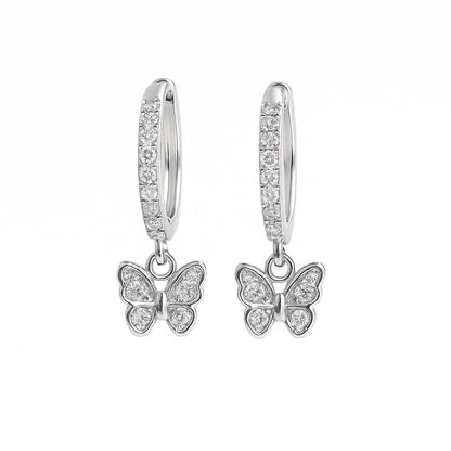 Butterfly earrings with diamond accents on a white background