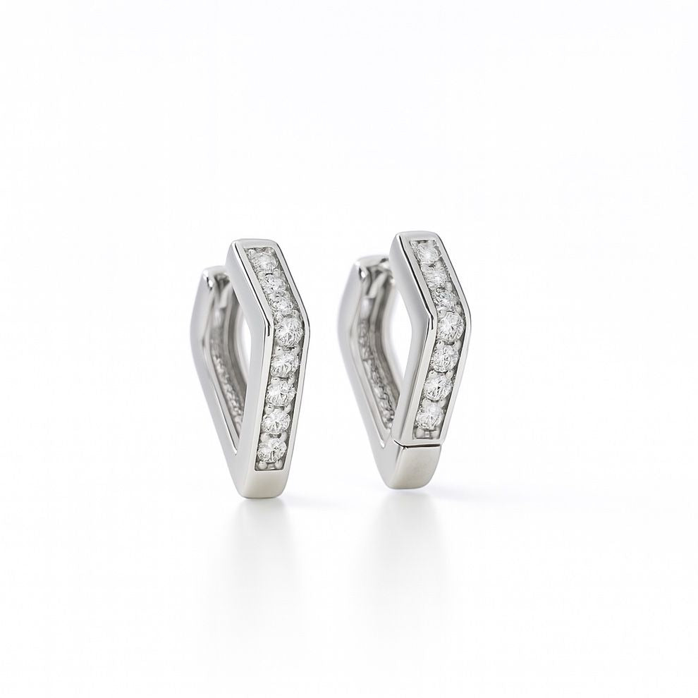 Pair of silver hoop earrings on a white background