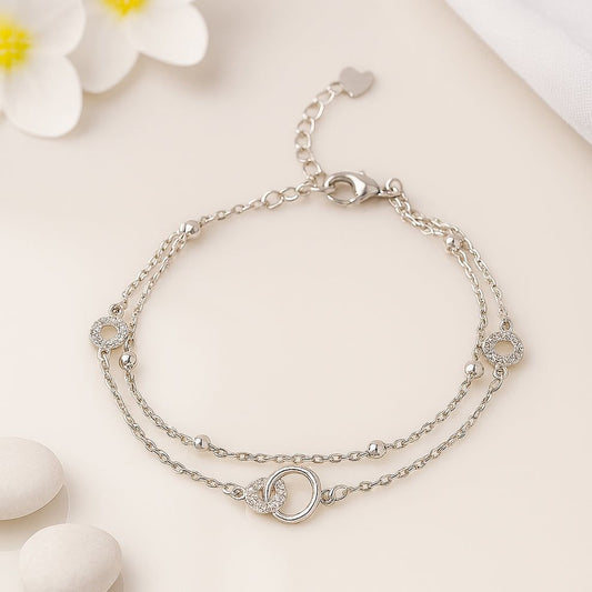 Layered Silver Chain Bracelet with Sparkling Circle Charms