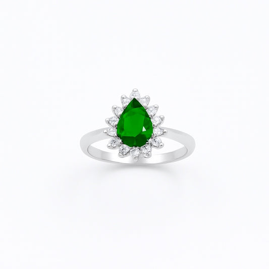 silver ring with a green gemstone on a white background