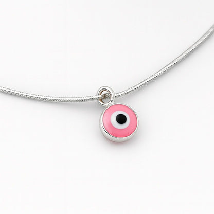 Silver pink evil eye anklet – minimal, stylish, and protective