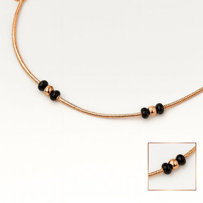 Rose gold silver anklet with black bead accents