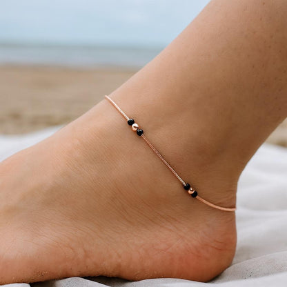 Rose gold silver anklet with black bead accents